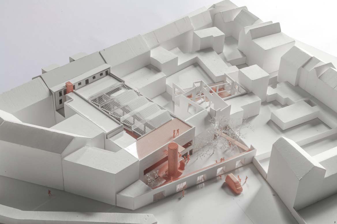 Witte maquette op schaal 1:200 van een herbestemde fabriekssite